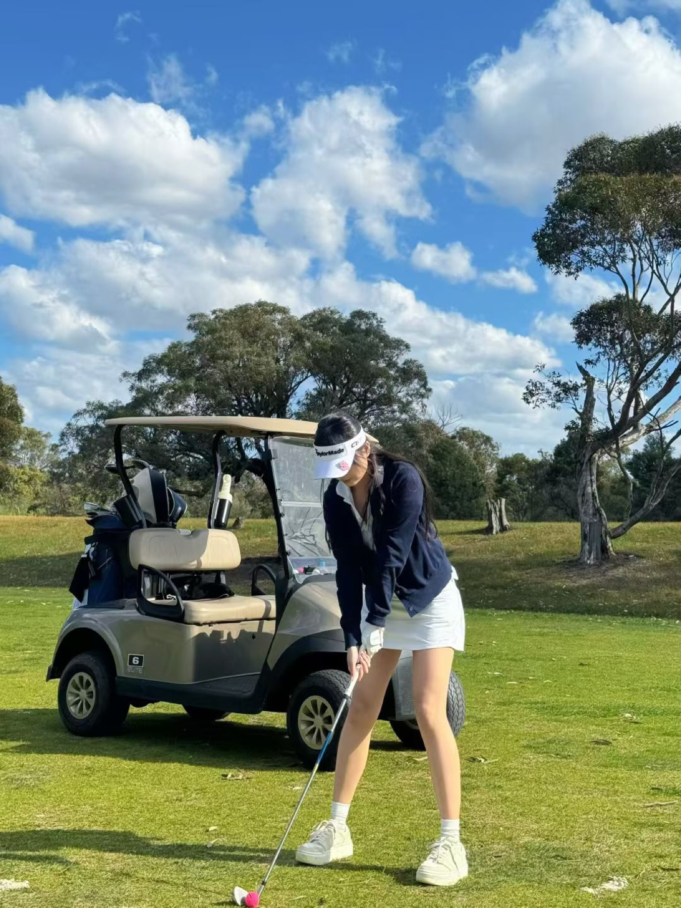 Sylvia playing golf